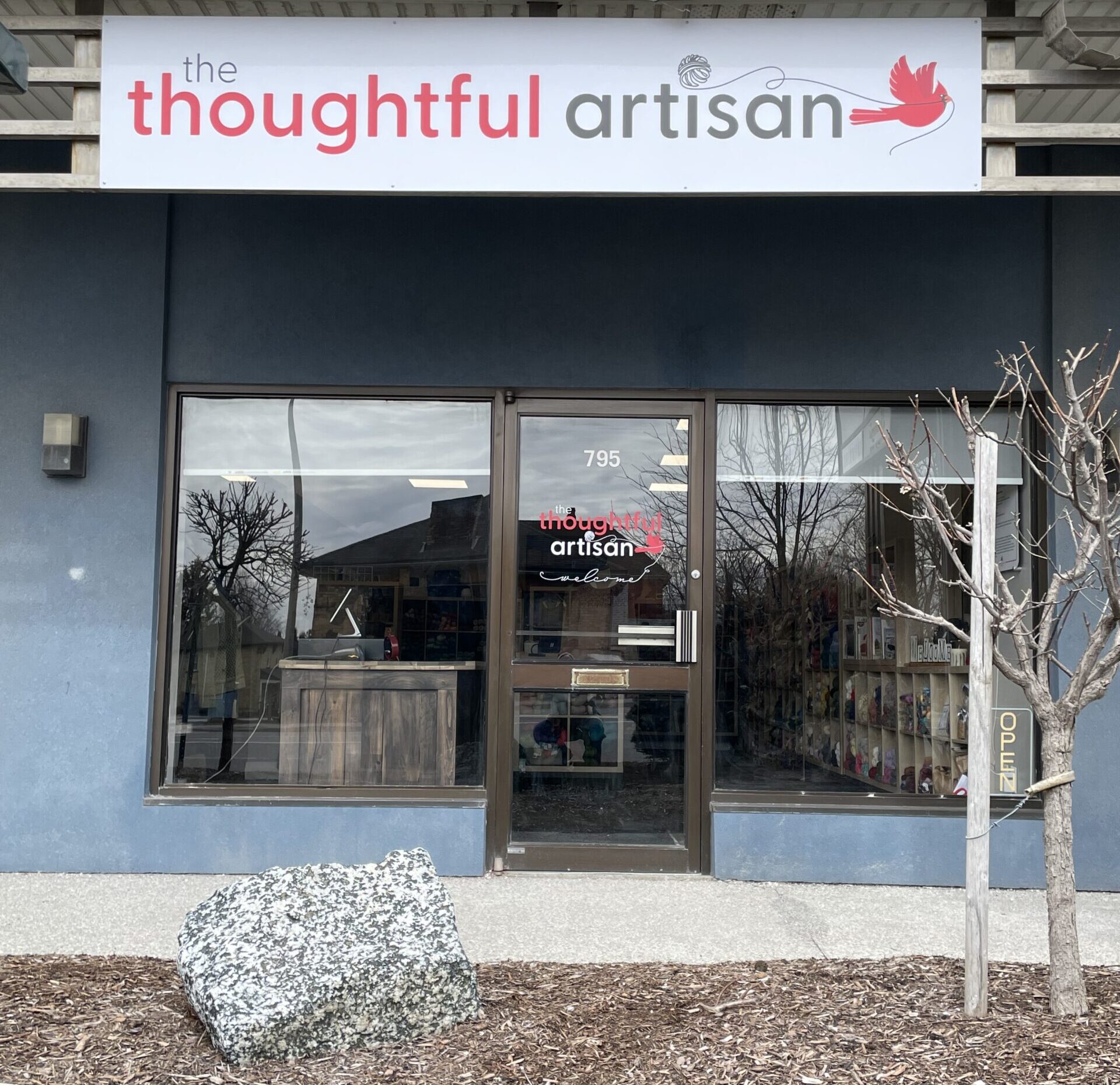 The Thoughtful Artisan store front with the open sign